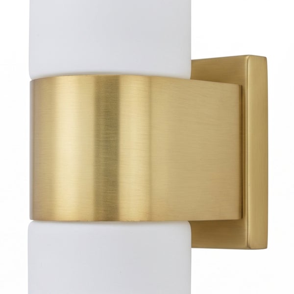 Moderne Wandleuchte in Metalloptik mit zylindrischem Leuchtmittel aus Glas für den Innenbereich.