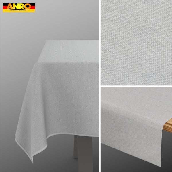 ANRO Logo. Strukturierte Tischdecke auf einem Tisch mit Detailansicht der Gewebestruktur und Kante.