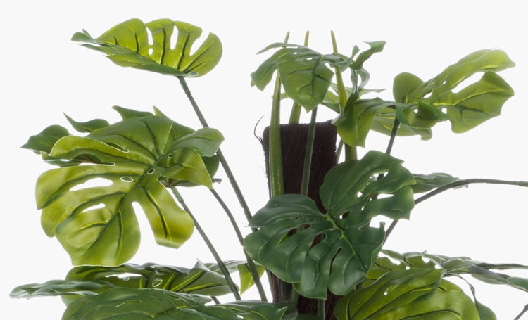 Künstlicher Fingerhut mit pinken Blüten und grünen Blättern.