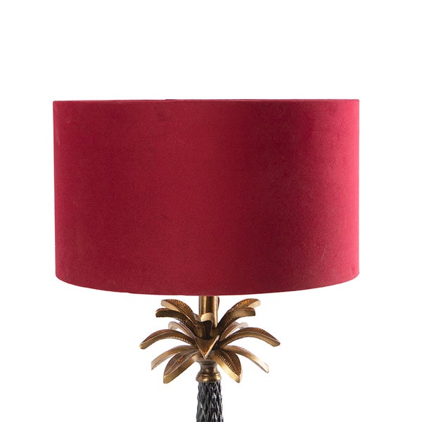 Tischleuchte mit rotem Schirm und goldenem Palmenfuß