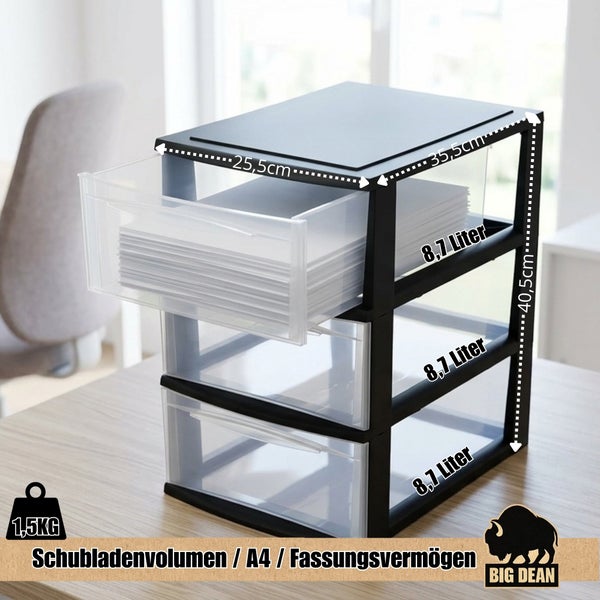 Schubladenbox mit drei transparenten Schubladen auf einem Tisch mit Maßangaben für Bürobedarf im A4 Format