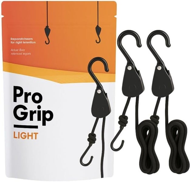 Zwei Pro Grip Light Seilratschen mit schwarzen Seilen und Haken inklusive Verpackung.