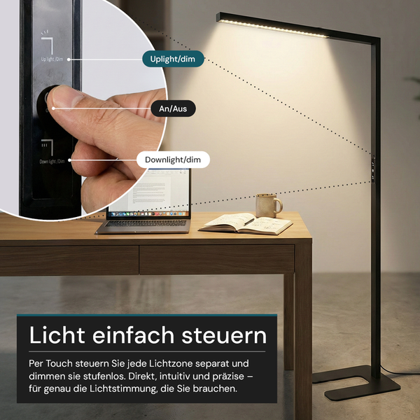 Schwarze Stehlampe mit Dimmfunktion an einem Schreibtisch mit Laptop und Buch