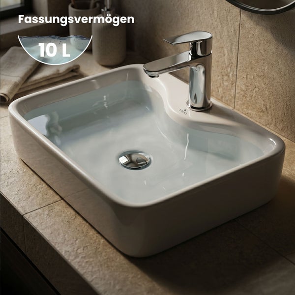 Aufsatzwaschbecken mit 10 Liter Fassungsvermögen und verchromter Armatur.