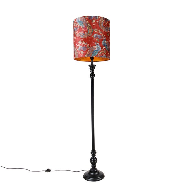 Stehlampe mit gemustertem Lampenschirm und schwarzem Gestell