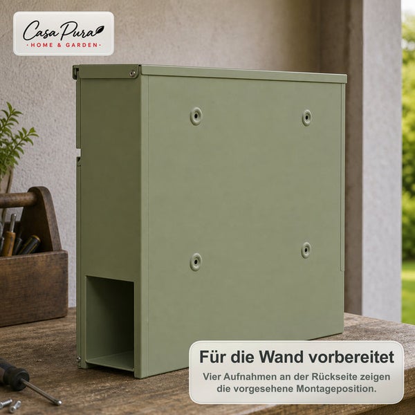 Rückansicht eines Briefkastens von Casa Pura mit vier vorgefertigten Befestigungslöchern für die Wandmontage auf einem Holztisch.