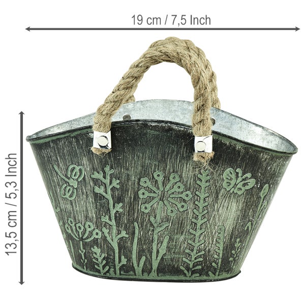 Metall-Pflanztopf mit Seilgriffen und floralem Muster, 19 Zentimeter breit und 13,5 Zentimeter hoch.