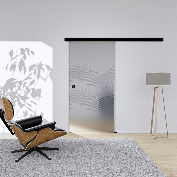 Schiebetür aus Glas mit Wellenmuster in einem Wohnzimmer