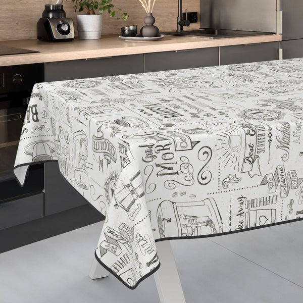 Tischdecke mit Kaffeemuster auf einem Tisch in einer Küche