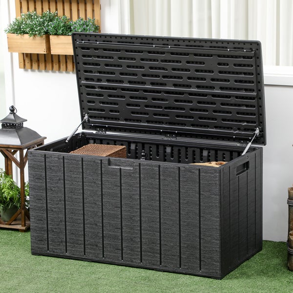 Gartenbox aus Kunststoff in Holzoptik, geöffnet, für die Aufbewahrung von Kissen und Zubehör auf der Terrasse.