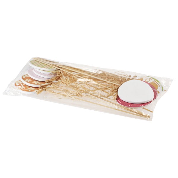 Dekorative Ostereier am Stiel in Plastikverpackung