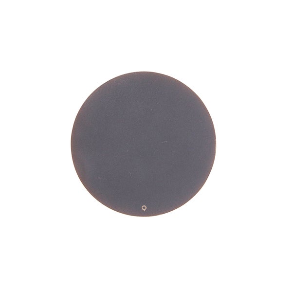 Runde Feinsteinzeugfliese in Anthrazit mit kleiner Markierung am unteren Rand.