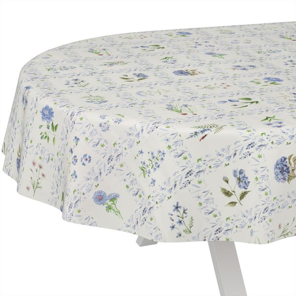 Runde Tischdecke mit blauem Blumenmuster.
