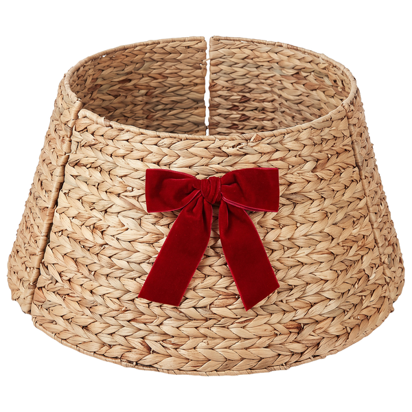 Weihnachtsbaumkorb aus geflochtenem Material mit einer Schleife zur dekorativen Abdeckung des Christbaumständers