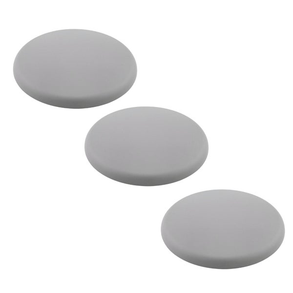 Drei runde Abdeckkappen