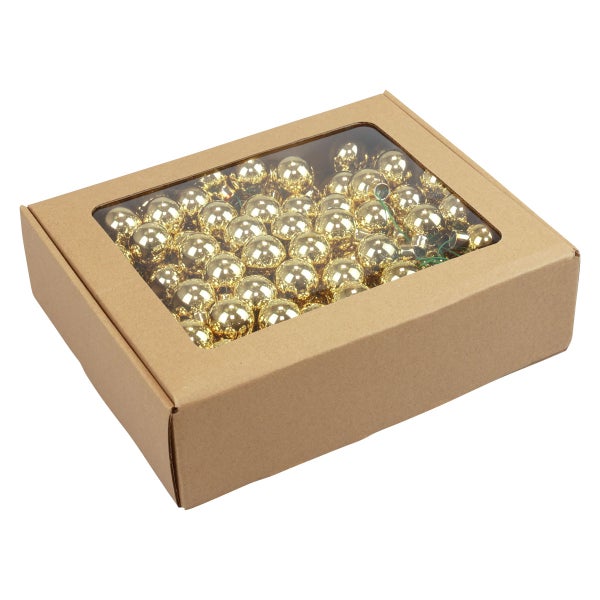 Karton mit goldenen Weihnachtskugeln