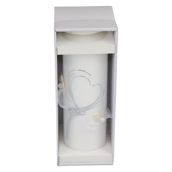 Weiße Kerze mit Herzmotiv in einer Geschenkverpackung