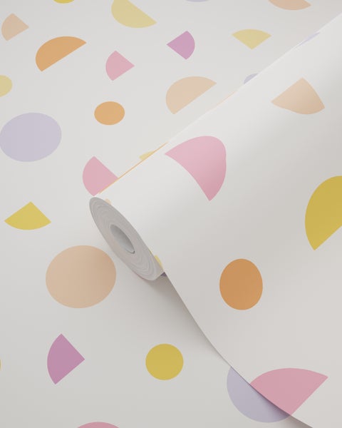 Vliestapete mit geometrischem Muster aus Kreisen und Halbkreisen.