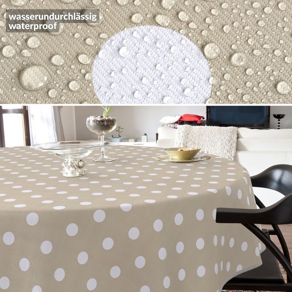 Beiger, wasserundurchlässiger Tischbelag mit weißen Punkten auf einem Tisch