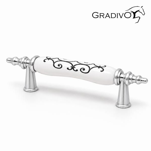 Klassischer Möbelgriff aus Metall mit weißem Keramik-Mittelstück und schwarzem Muster. Gradivo Logo.
