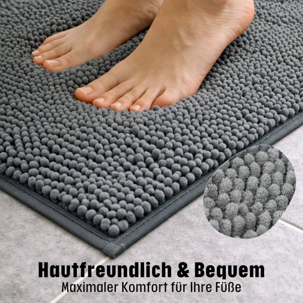 Hautfreundliche und bequeme Badematte aus Chenille-Mikrofaser mit Noppenstruktur und Füßen zur Demonstration des Komforts.