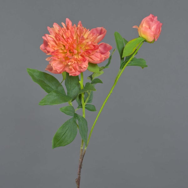Künstlicher Eukalyptuszweig mit dunkelroten Blättern und grünen Fruchtkapseln.