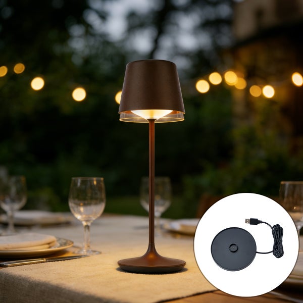 Moderne LED-Tischleuchte für den Außenbereich auf einem gedeckten Tisch mit USB-Ladestation.
