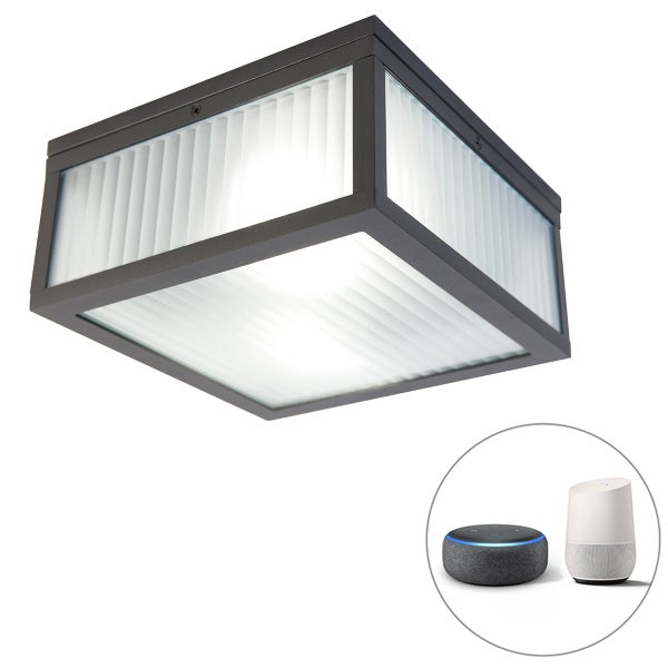 Quadratische Außenleuchte aus dunklem Metall und geriffeltem Glas, kompatibel mit Smart Home Assistenten.