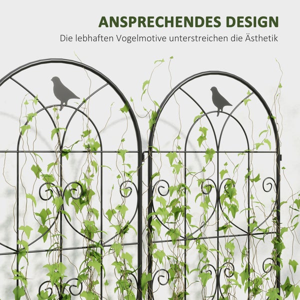 Metall-Rankgitter mit zwei Bögen, dekorativen Ornamenten und Vogelmotiven, bewachsen mit Kletterpflanzen.