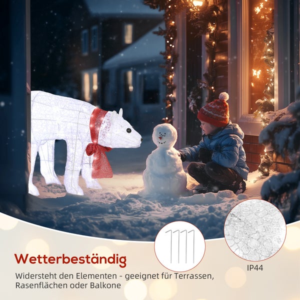 Beleuchteter LED-Eisbär mit roter Schleife in verschneitem Garten mit Kind und Schneemann, wetterbeständig und spritzwassergeschützt.