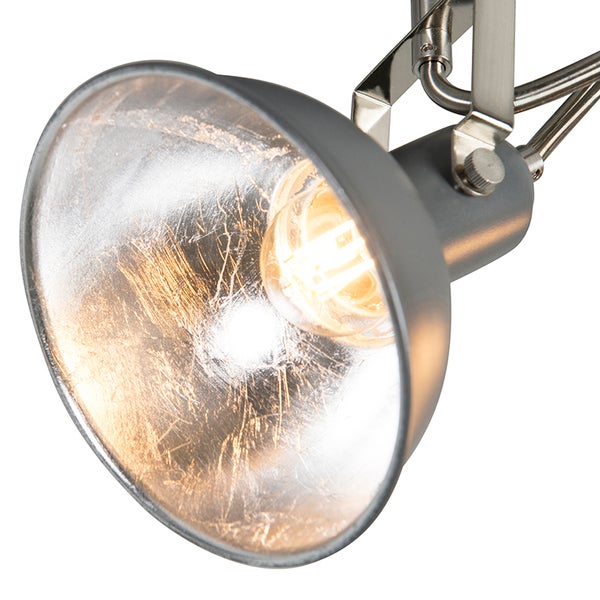 Nahaufnahme einer grauen Innenraumlampe mit silbernem Reflektor