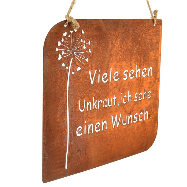 Dekoratives Rostschild mit Ausschnitt eines Pusteblumendesigns und dem Spruch Viele sehen Unkraut, ich sehe einen Wunsch.