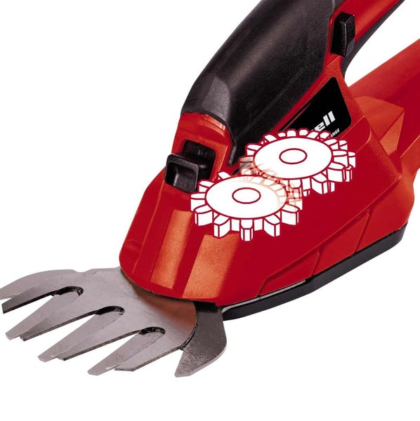 Detailansicht einer Grasschere mit Symbol für das robuste Metallgetriebe auf dem Gehäuse und den Schneidmessern.