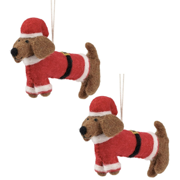 Zwei Dackel als Weihnachtsschmuck mit Nikolauskostüm.