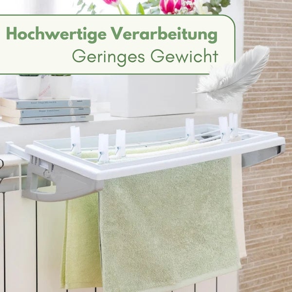 Weißer Heizkörpertrockner am Heizkörper mit Handtüchern und Wäscheklammern, hochwertige Verarbeitung und geringes Gewicht.