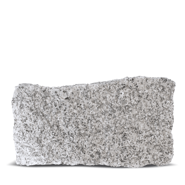 Mauerstein aus Granit mit gespaltener Oberfläche und gesprenkelter Textur.