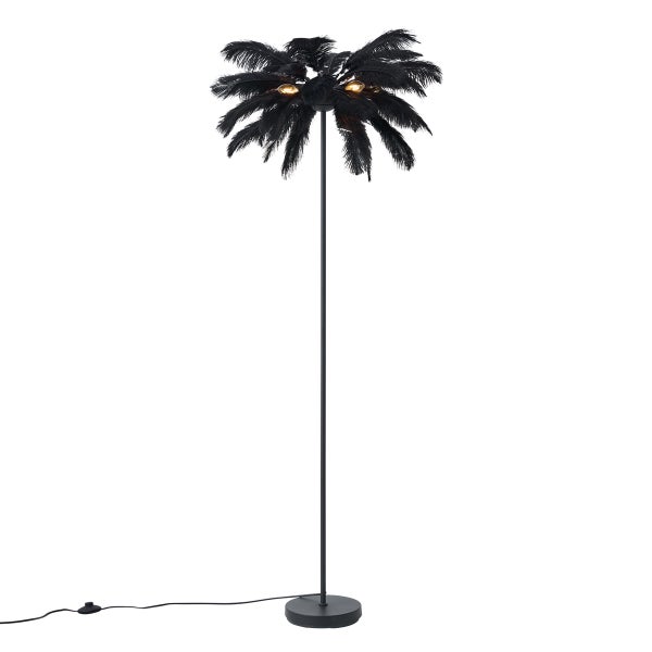Stehleuchte im Palmen-Design mit schwarzen Federn, Metallgestell und rundem Standfuß.