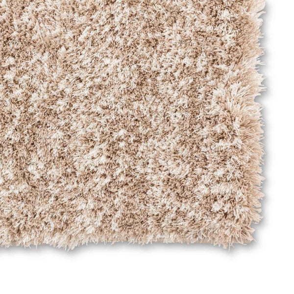 Hochflor-Teppich Shaggy in Beige mit weicher Struktur.