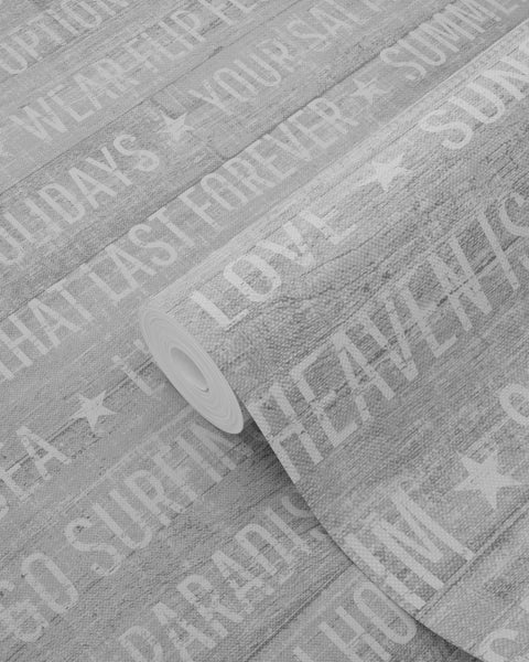 Tapetenrolle mit Schriftzug