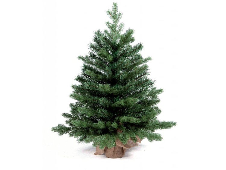 Künstlicher Weihnachtsbaum mit Jutetuch an der Basis