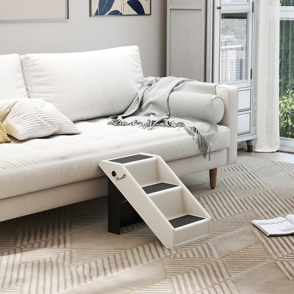 Szene mit Sofa, Schrank und einer dreistufigen Hundetreppe von Pawhut