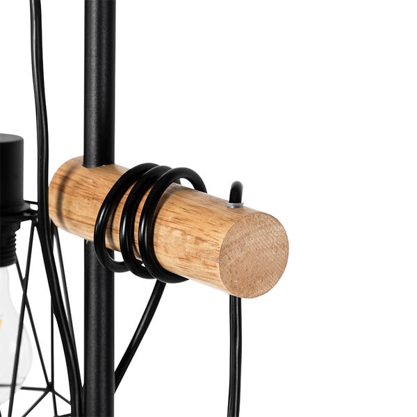 Detailaufnahme einer Lampe mit Holz- und Metallelementen