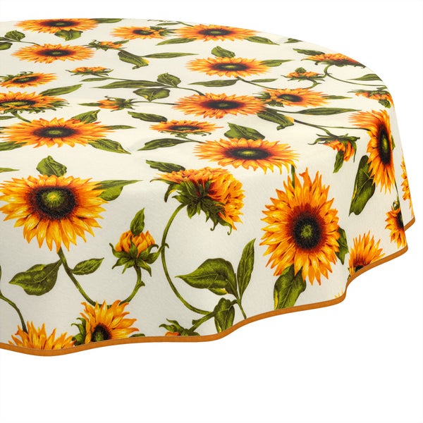 Runde Tischdecke mit Sonnenblumenmuster.