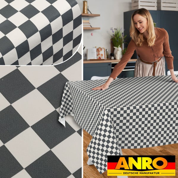 Abwaschbare Tischdecke mit Karomuster in einer hellen, modernen Küche, Detailansicht der Oberflächenstruktur, ANRO Deutsche Manufaktur Logo.
