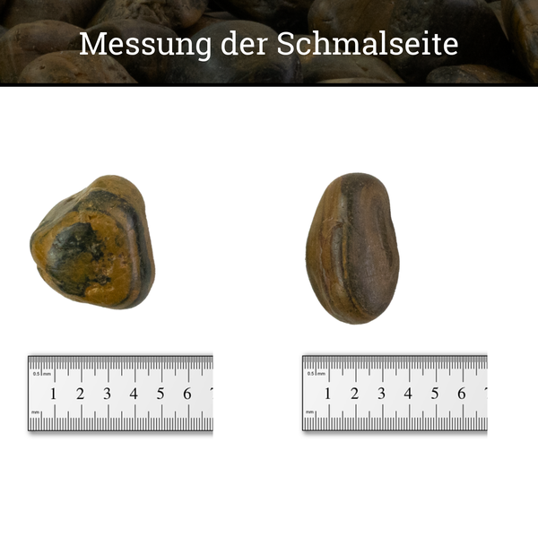 Messung der Schmalseite von zwei Natursteinen mit einem Lineal in Millimeter.