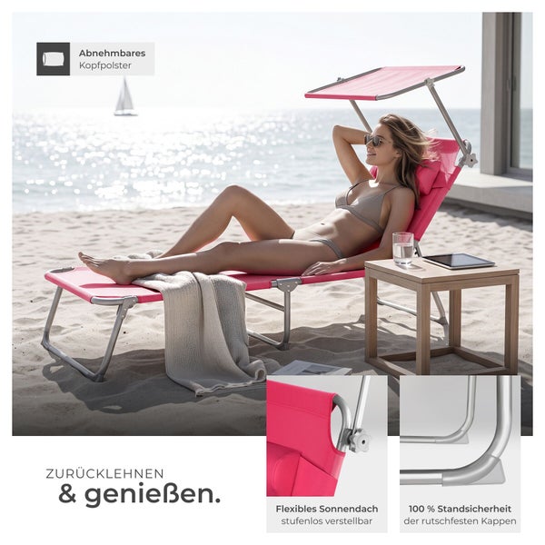 Pinke Gartenliege mit verstellbarem Sonnendach und Kopfpolster am hellen Strand, stabiles Metallgestell mit rutschfesten Kappen und Holztisch.