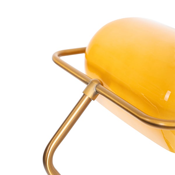 Detail einer Schreibtischlampe mit Metallgestell