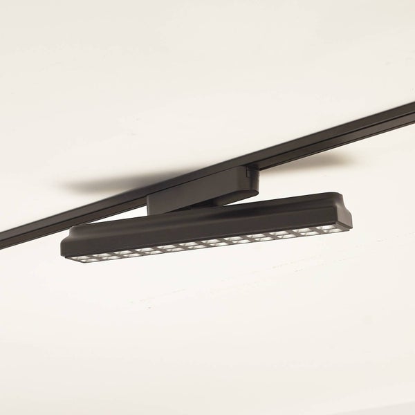 Schwarze lineare Schienenleuchte mit mehreren sichtbaren Lichtsegmenten.