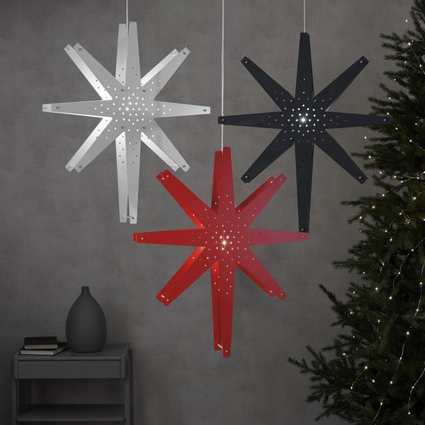 Dekorative Sternleuchten in Weiß, Rot und Schwarz mit Beleuchtung