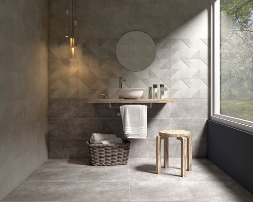 Badezimmer mit grauen Fliesen, Waschbecken, Spiegel und Holzelementen für ein modernes Design